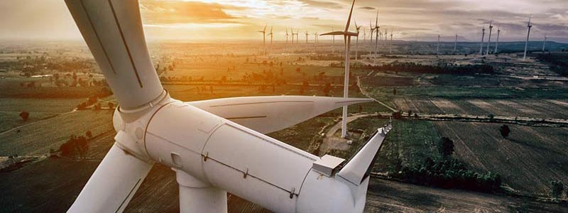 Aerial view of turbines on a wind farm.