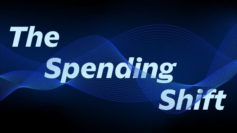 Flowing, dynamic pattern in blue tones with the text “The Spending Shift”.