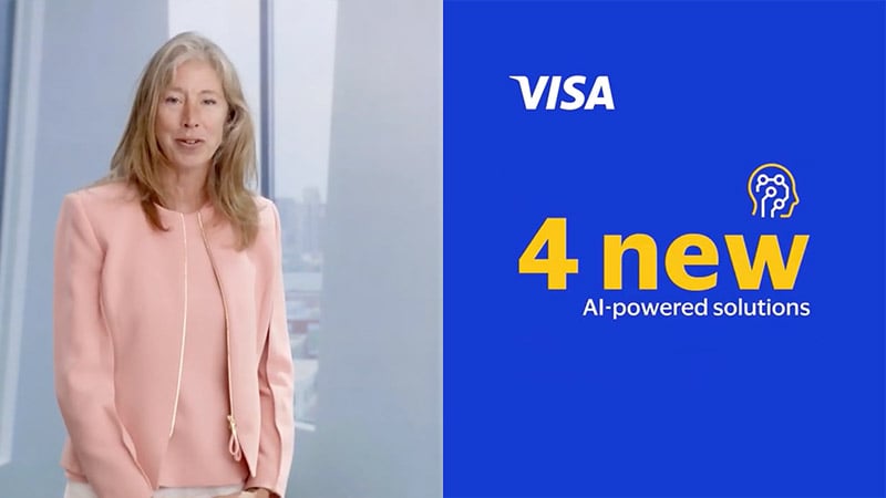 Woman standing in a room talking to camera next to graphic with Visa and 4 new AI-powered solutions text.