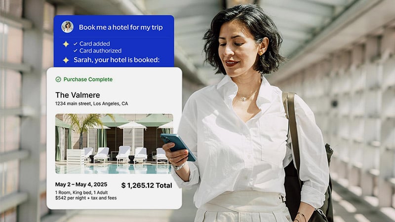 Smiling woman holding phone with Visa AI agent user interface overlaid