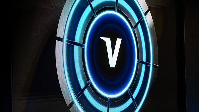Screen showing a lit-up vault door with a Visa V in the center.