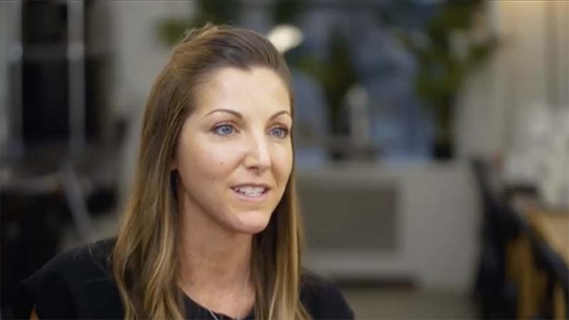 Woman talking to camera.